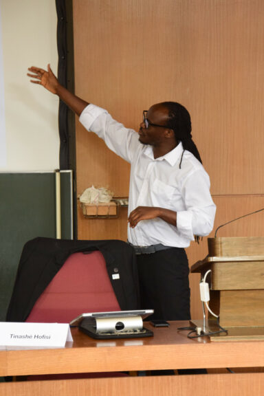 Picture of Tinashé Hofisi during lecture.